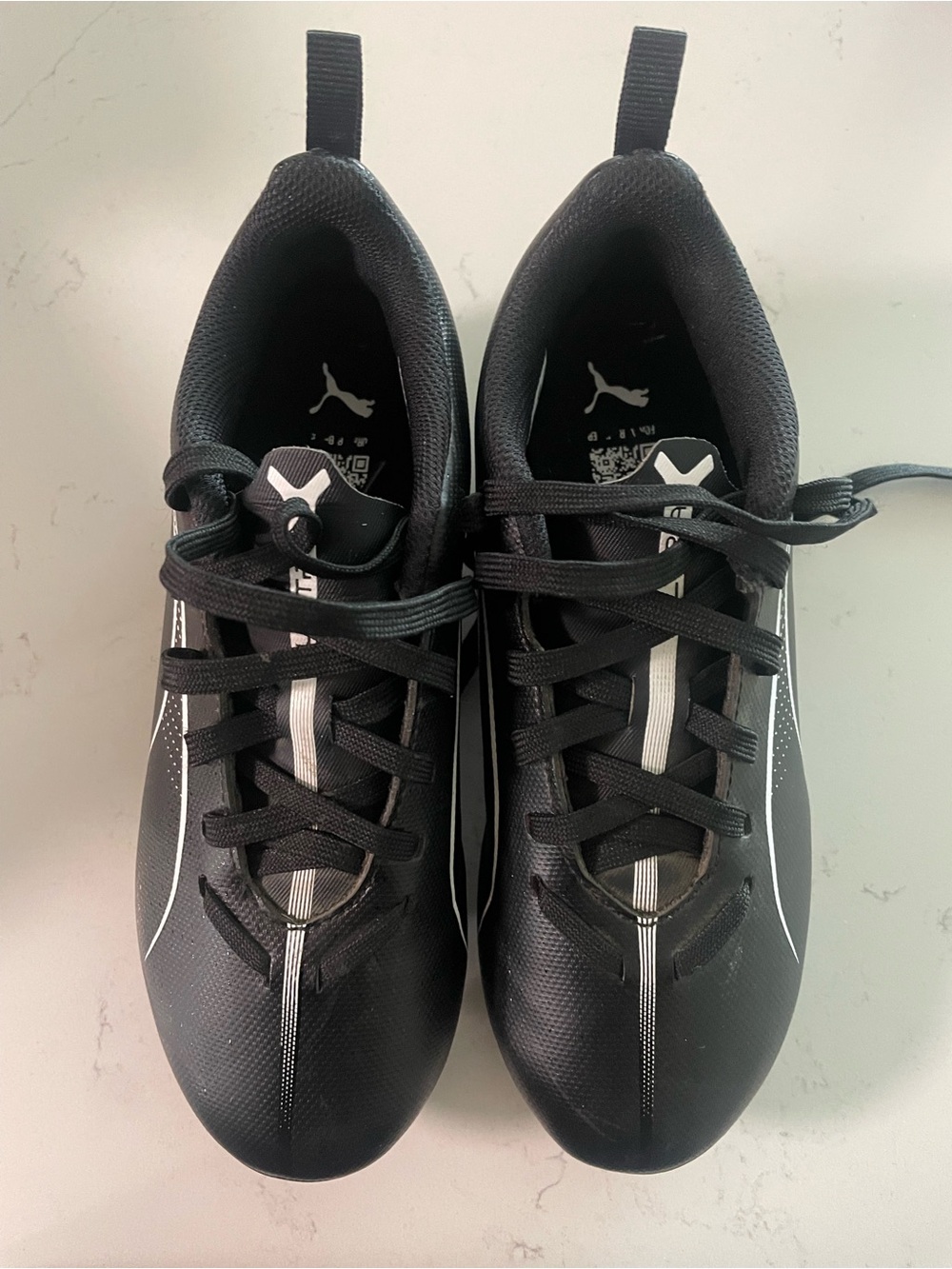Puma Black and White cleats